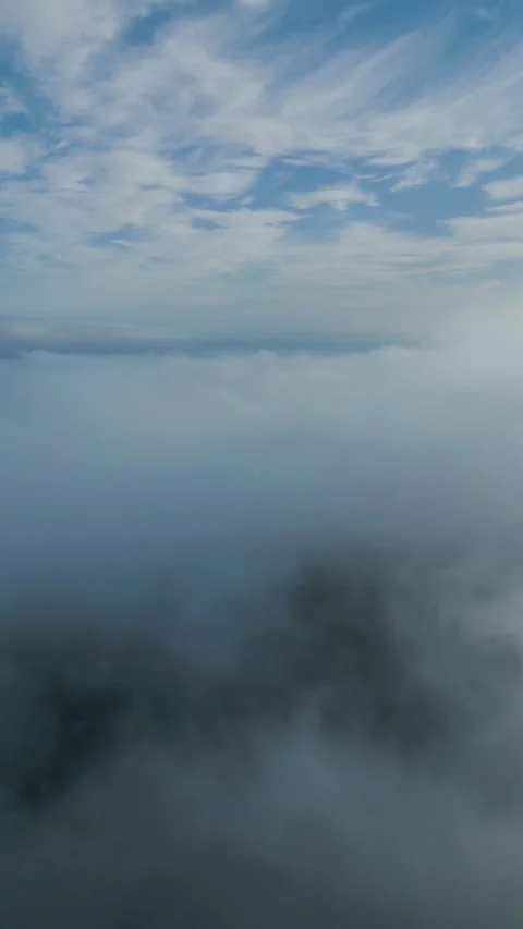 Flying Through Clouds Toward Sunlight | Aerial 4K Drone Clip Video stock 317358507