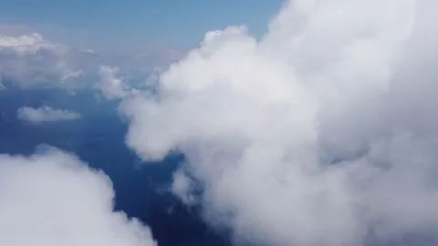 Flying through clouds view from a window of a helicopter Stock Footage 130479970