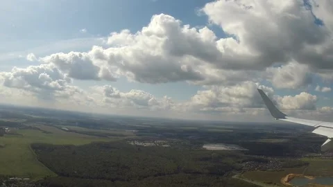 Flying through the clouds on a windy day over Europe. Stock Footage 147035005