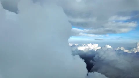 Flying Through Cottony Clouds: Pilot POV in a Real Time Flight Through Layers Stock Footage 318948684