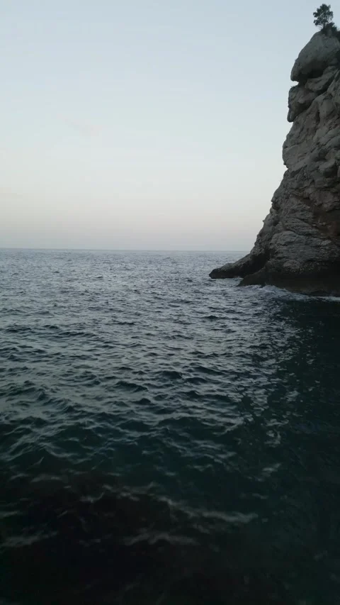 Flying through a cove in Old Town, Dubrovnik. vertical video 스톡 동영상 254043586