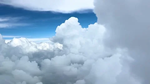 Flying through cumulonimbus clouds at low altitude Stock Footage 296822148