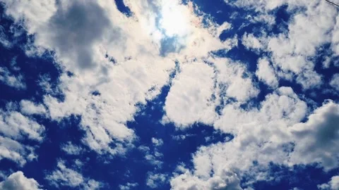 Flying through cumulus clouds at high altitude with clear skies Stock Footage 337257096