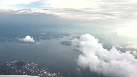 FLYING THROUGH CUMULUS CLOUDS ON A SUNNY DAY Stock Footage 340149169