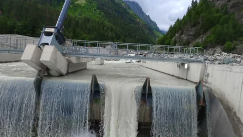 Flying through a dam in a mountain river Stock Footage 223905269