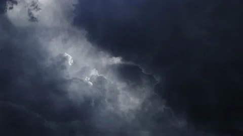 Flying through in dark cumulonimbus clouds with lightning flashes. Stock Footage 167326544