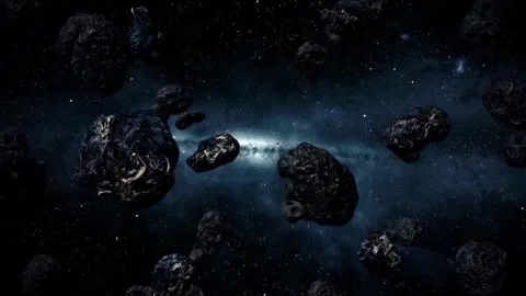 Flying through a dense asteroid field in deep space. Stock Footage 336718935