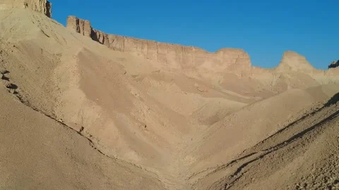 Flying through the desert pass between hills Stock Footage 149962270