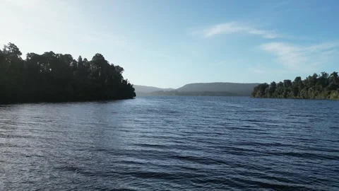 Flying Through Dock to Lake – Aerial Journey Stock Footage 303285053