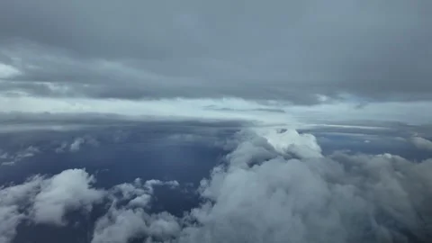 Flying Through a Dramatic Sky: A Pilot’s Perspective From a Jet Cockpit While Stock Footage 305129367