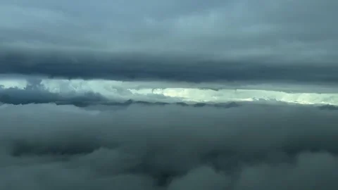 Flying Through a Dramatic Stormy Sky: an Immersive Pilot’s Perspective from Stock Footage 300603160
