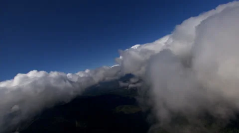 Flying through drifting puffs of clouds Stock Footage 59418790
