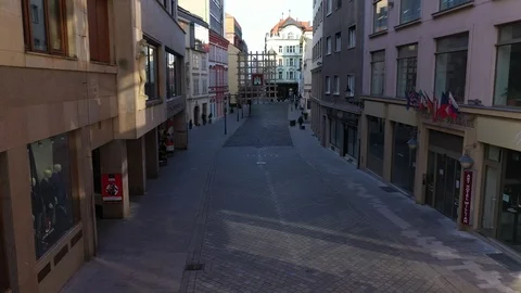 Flying through empty Laurinska street in centre Bratislava above city sign Stock Footage 127448532