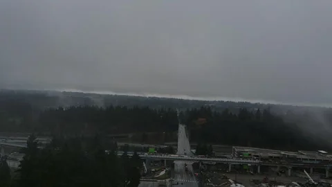 Flying through the gloomy Seattle over interstate highway 5 스톡 동영상 332730207