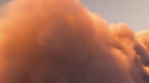 Flying through the golden sunset clouds seamless loop Stock Footage 77332957