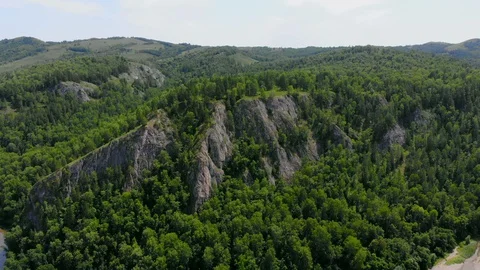 Flying through the green mountains. River. Stock Footage 129508643
