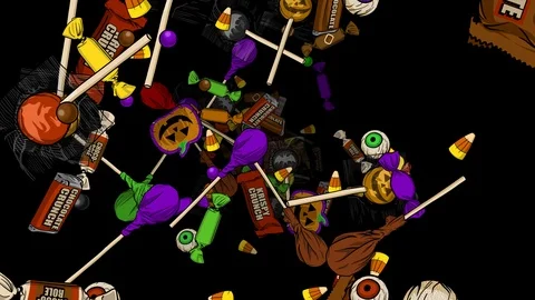 Flying Through Halloween Candy on Black Stock Footage 124648901