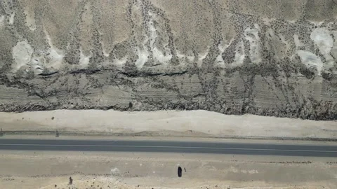 Flying through the highway with an opening view of the mountain desert Stock Footage 237693666