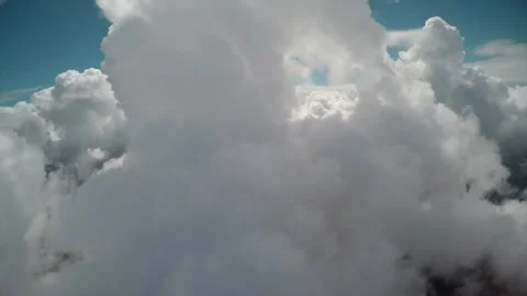 Flying through hole in a cloud Vídeo Stock 240161708