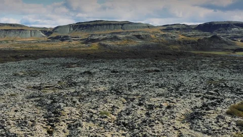 Flying through the Icelandic epic Lava field moss-covered landscape. Stock Footage 116244529