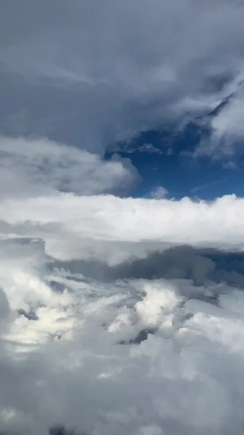 Flying through layers of bright summer sky white storm clouds Stock Footage 292763178