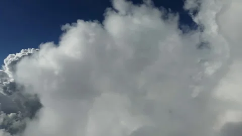 Flying Through Massive Cloud Formations at High Altitude Stock Footage 304989348