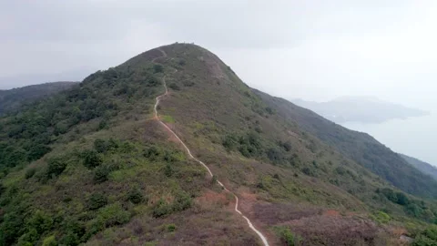 Flying through the mountains in the Ling Wui Shan, Lantau Island, Hong Kong Stock-Footage 195281509
