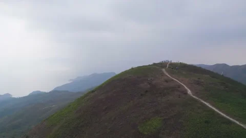 Flying through the mountains in the Ling Wui Shan, Lantau Island, Hong Kong Video stock 195281613