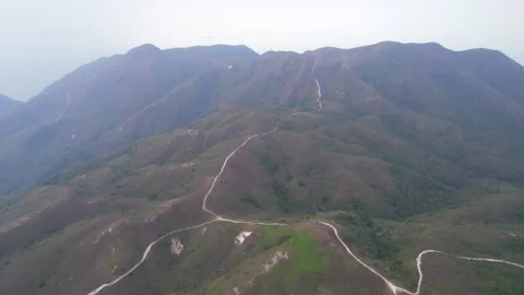 Flying through the mountains in the Ling Wui Shan, Lantau Island, Hong Kong Video stock 195281646