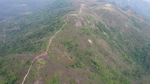 Flying through the mountains in the Ling Wui Shan, Lantau Island, Hong Kong Video stock 195281654