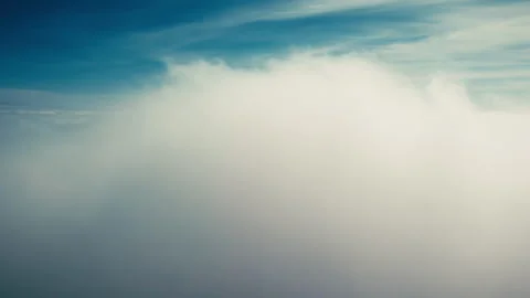 Flying up through moving clouds Stock Footage 274312786
