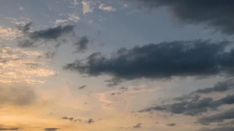 Flying through a moving cloudscape with beautiful sunbeams. Video stock 334787829