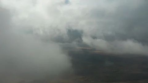 Flying through the rain clouds. Dramatic sky view Stock Footage 117048450