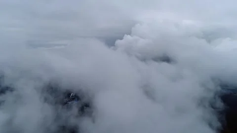 Flying through rain clouds Stock Footage 262796973