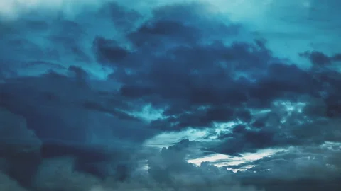 Flying through rain clouds. Sunset Stock Footage 211785375