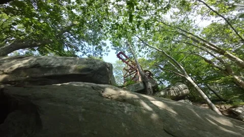 Flying through rocks and caves FPV drone view Video stock 246087572