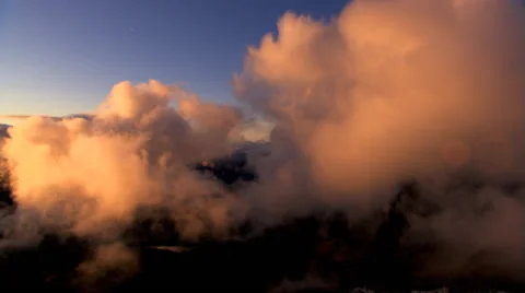 Flying through rosy-gold clouds, tilting left Stock Footage 59431330