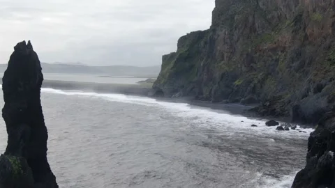 Flying Through Sea Stacks Off Coast of Iceland 스톡 동영상 210234377