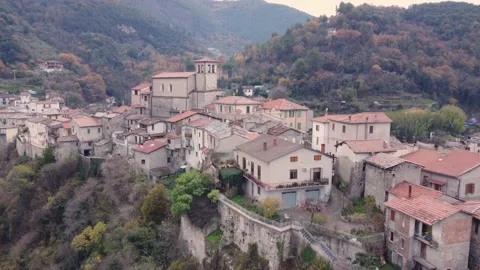 Flying through the small city of Papigno Stock Footage 169314687