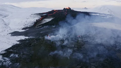Flying through smoke over volcano in Iceland Aerial Video stock 156276009