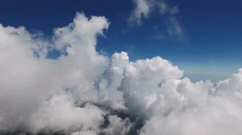 Flying Through Soft Fluffy Clouds on High Altitude Stock Footage 68720523