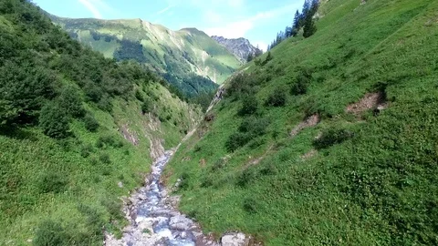Flying through steep canyon in german alps Stock Footage 108720628