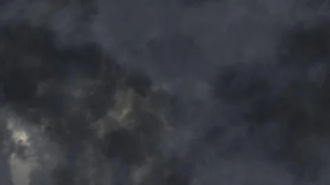 Flying through storm clouds with lightning strike Stock Footage 316702148