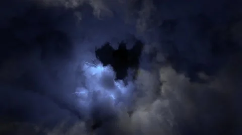 Flying through stormy clouds lit with lightning bolt flash, looped Stock Footage 67529882