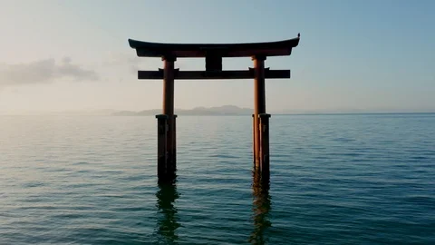Flying through torii gate in Lake Biwa Stock Footage 118971961