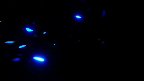 Flying through a tunnel with blue waves. Looped seamless animation. Stock Footage 170235502