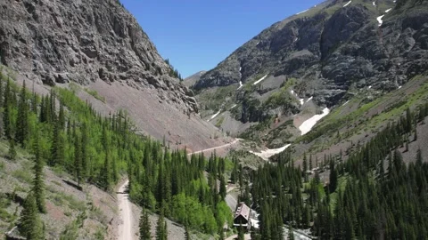 Flying Through Valley Toward Animas Forks Colorado 4K Stock Footage 244678152