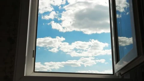 Flying through the window to the clouds. Beautiful blue Stockbeeldmateriaal 162193743