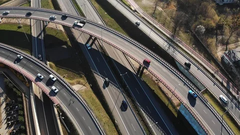 Flying tilt shift panorama over a busy highway with many lanes in Warsaw, Poland Stock Footage 128080420