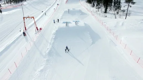 Flying on top of ski resort base Stock Footage 109111269